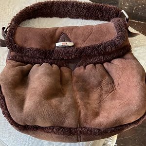 Marc Jacobs chocolate brown shearling bag.
